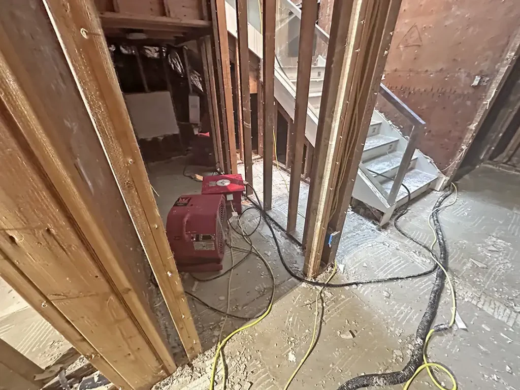 Fans and stairs during water damage restoration