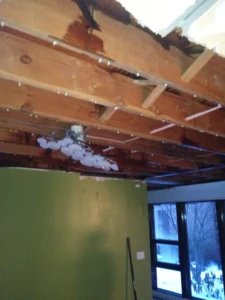Water damaged roof before water damage restoration